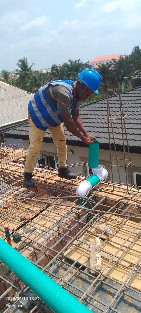 Princekay plumber fixing a soil stack on a reinforced roof slab
